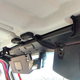 The JL Wrangler keeps the metal latches above the visors, but adds locating dowels and an additional L-latch.